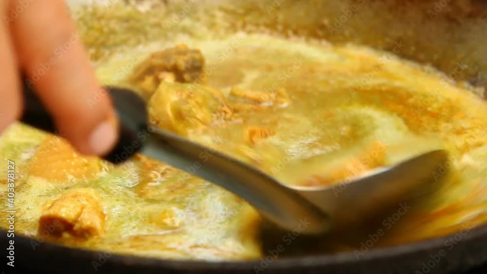 Cooking chicken curry in pan , Asian famous food. Cooking chicken curry in pan , Asian famous food.