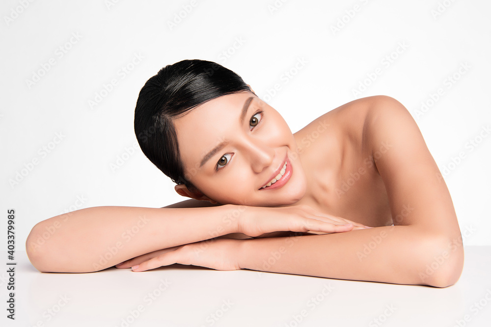 Beautiful Young asian Woman with Clean Fresh Skin, on Pink background, Face care, Facial treatment. Cosmetology, beauty and spa. Asian women portrait Beautiful Young asian Woman with Clean Fresh Skin, on Pink background, Face care, Facial treatment. Cosmetology, beauty and spa. Asian women portrait