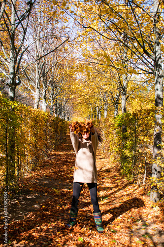 Girl with autumn colors at the San Ildefonso Farm. © alba