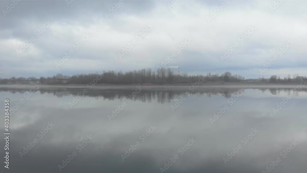 Island cloudy river fog over water autumn winter camera movement industrial pollution pipe Island cloudy river fog over water autumn winter camera movement industrial pollution pipe