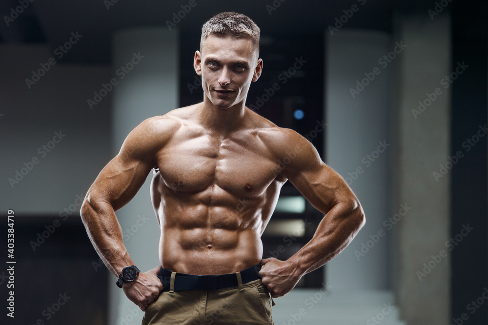 Fitness athletic man workout muscles exercise