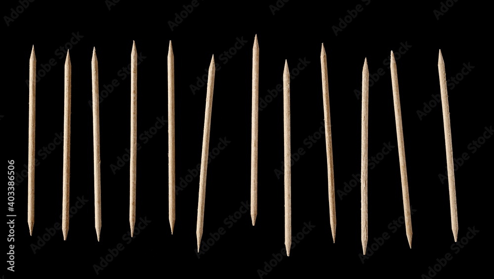 Wooden toothpick set and collection isolated on black background Wooden toothpick set and collection isolated on black background