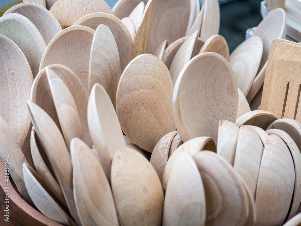 Obraz premium Hand made wooden traditional romanian tablespoons on dispaly for sale.