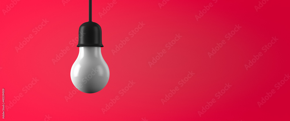 Hanging lamp on a red background. The light is off. Copy space. Hanging lamp on a red background. The light is off. Copy space.