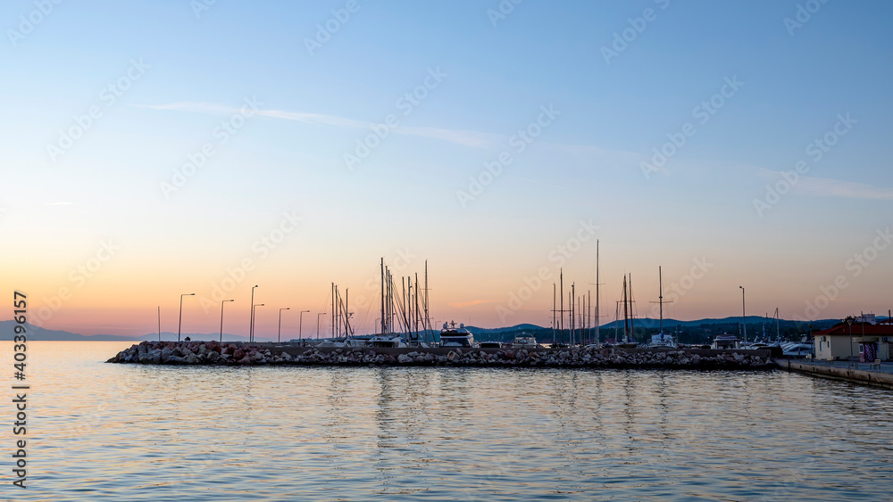 Sea port at sunset in Greece
