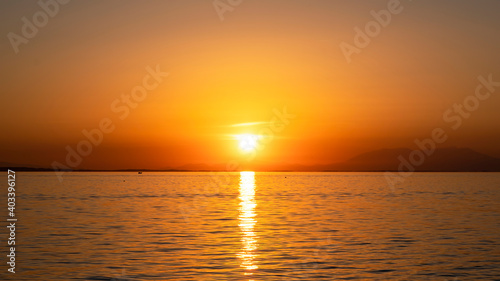 Sunset on the Aegean sea coast in Greece