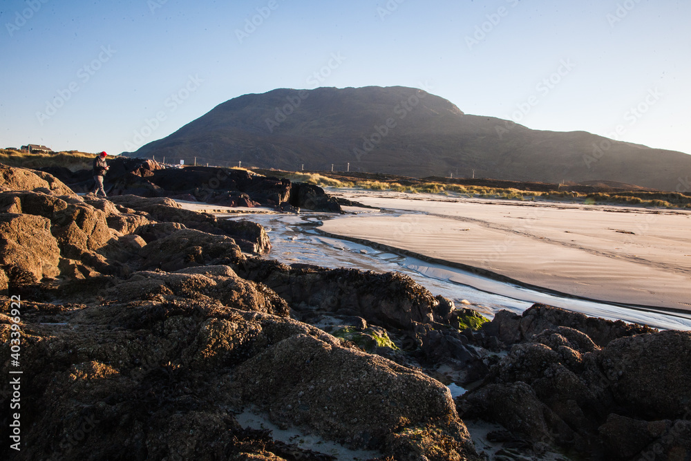 black rocks on an irish beach