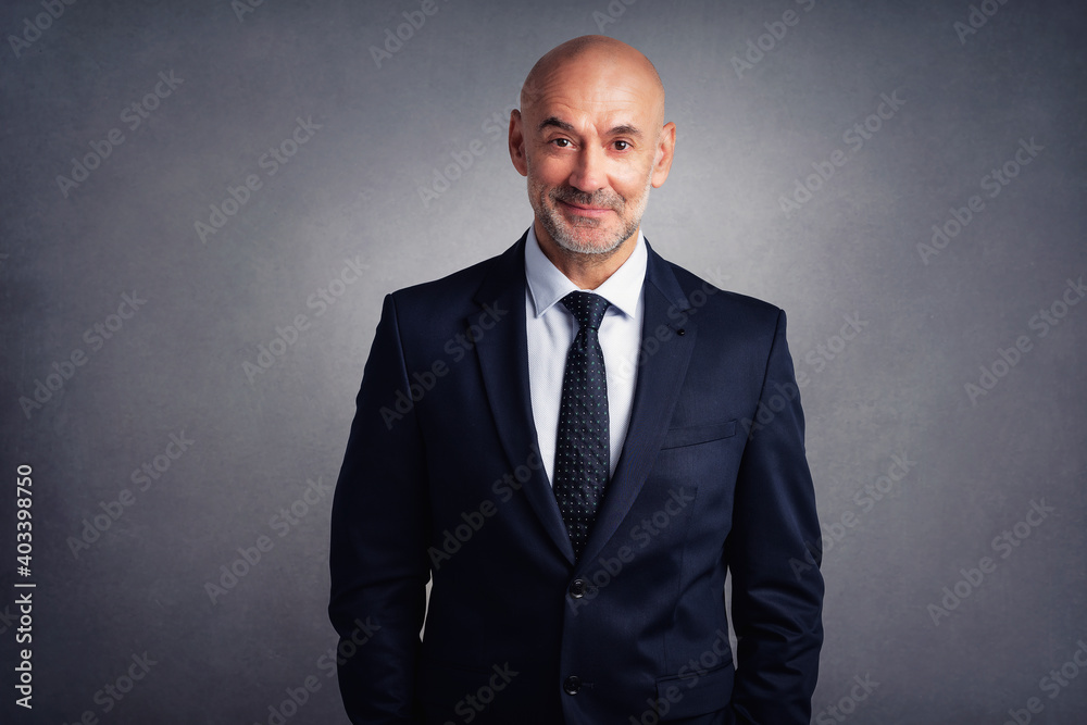 Portrait of executive businessman standing at isolated background Portrait of executive businessman standing at isolated background