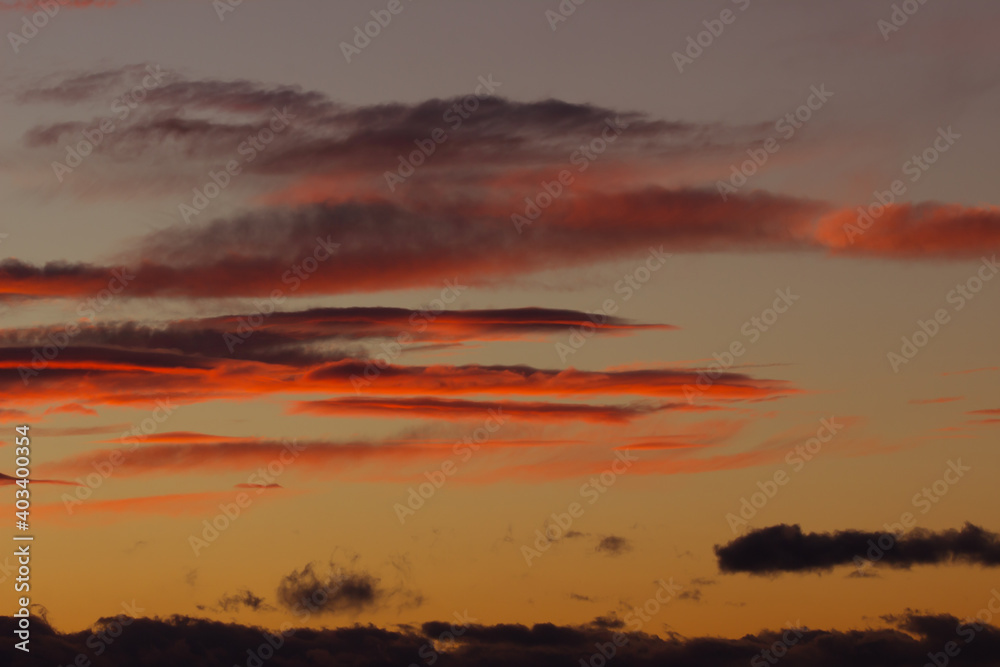 sky landscape with unusual clouds of rich colors at sunset sky landscape with unusual clouds of rich colors at sunset