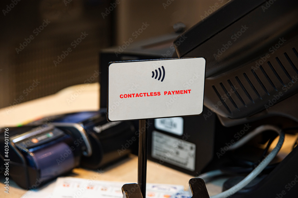 NFC credit card in contactless payment point transaction terminal, online payment point.