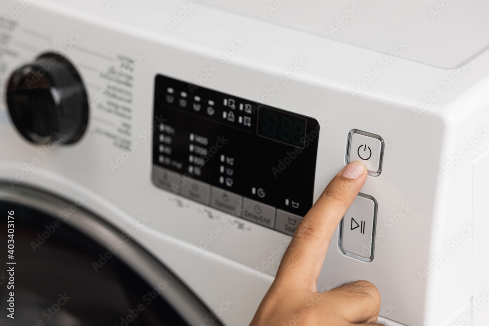 Finger press the switch to make the washing machine work. Home appliances Finger press the switch to make the washing machine work. Home appliances