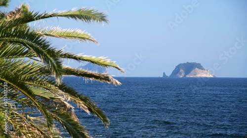Two islands on the blue sky and sea