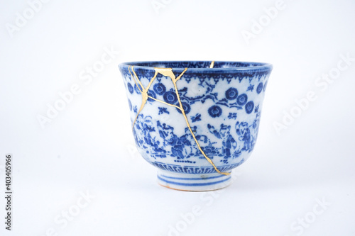 White and blue decorated Japanese tea cup