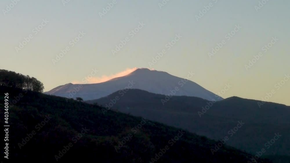 Sunrise with a view of Mount Etna from the Nebrodi mountains, Sicily, Italy. Sunrise with a view of Mount Etna from the Nebrodi mountains, Sicily, Italy.