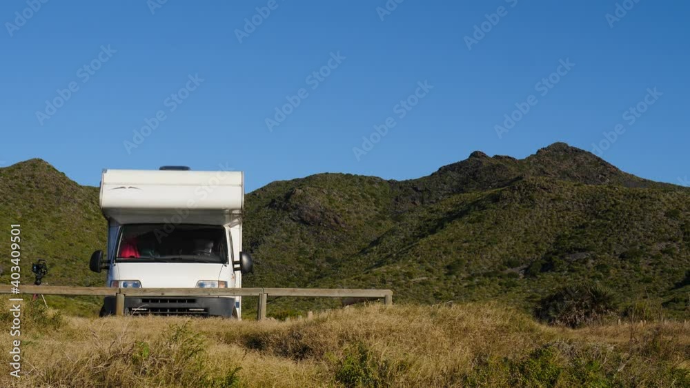 Camper, recreational vehicle on nature in Spain. Calblanque Natural Park, Murcia. Traveling by motorhome. Caravan vacation. Camper, recreational vehicle on nature in Spain. Calblanque Natural Park, Murcia. Traveling by motorhome. Caravan vacation.
