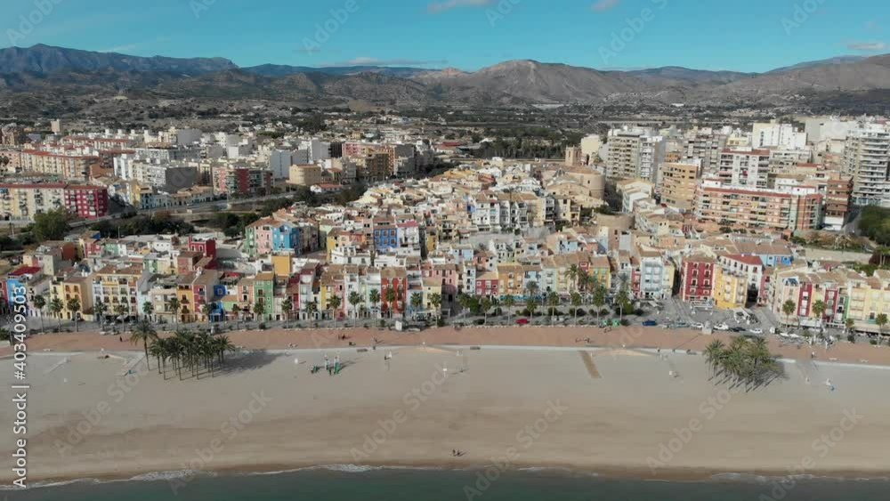 Aerial drone point panoramic view coastline and La Vila Joiosa Villajoyosa touristic resort townscape view from top, sandy beach and mediterranean seascape. Province of Alicante, Costa Blanca, Spain
Aerial drone point panoramic view coastline and La Vila Joiosa Villajoyosa touristic resort townscape view from top, sandy beach and mediterranean seascape. Province of Alicante, Costa Blanca, Spain