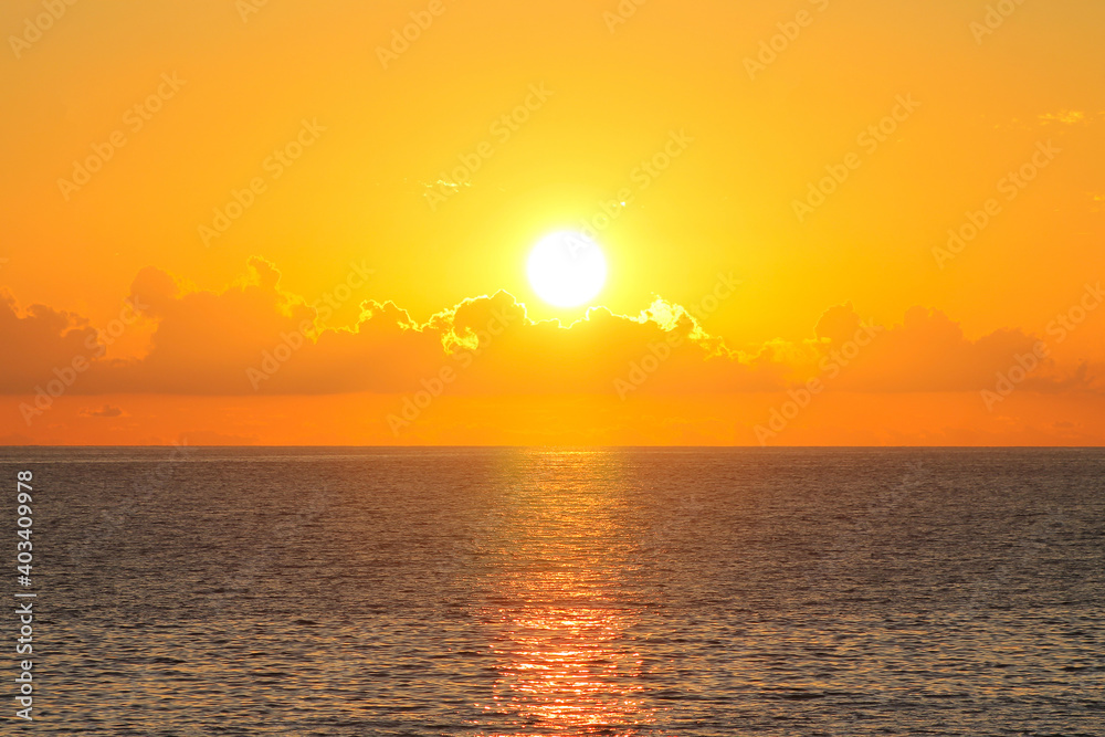 Scenic sunset sky at sea