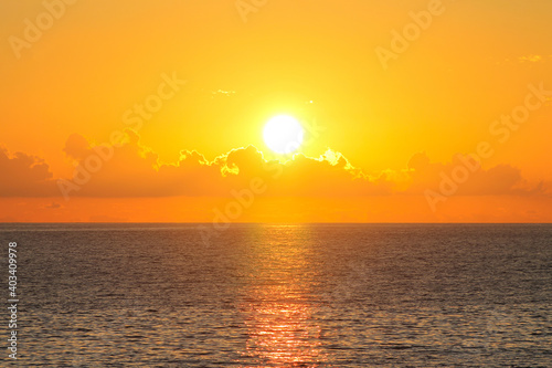 Scenic sunset sky at sea