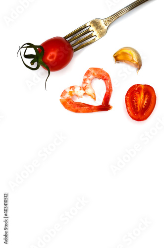 Cherry tomato and shrimp on a silver fork, ingredients for cooking, healthy eating concept, diet, organic nutrition
