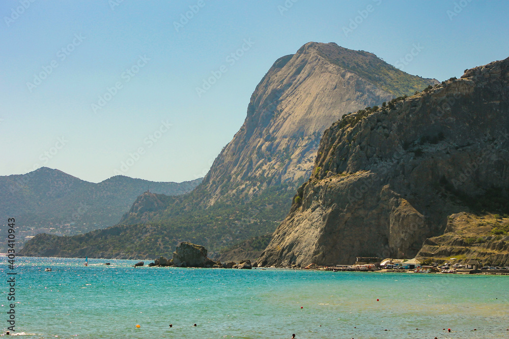 Scenic view on sea and rocky shore