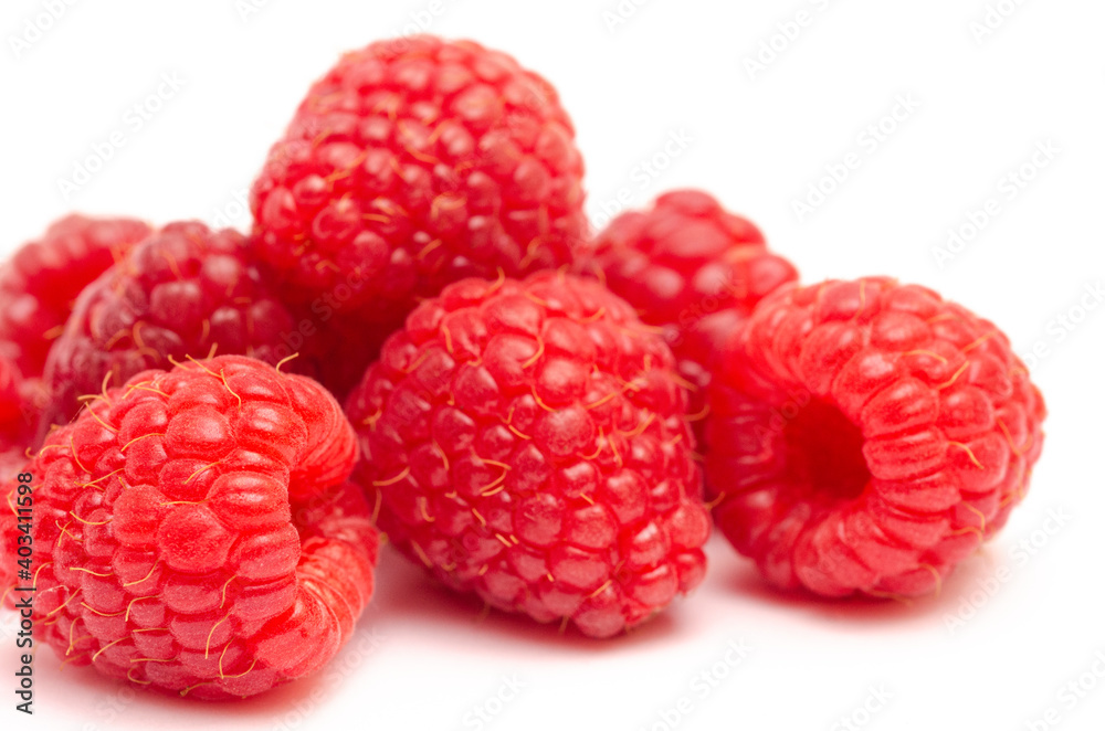 Closeup of red raspberry berries on white background Closeup of red raspberry berries on white background