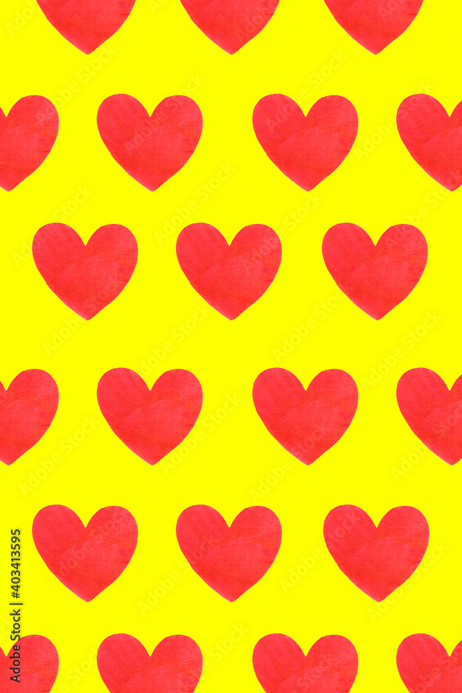 Several wooden hearts against yellow background, love concept