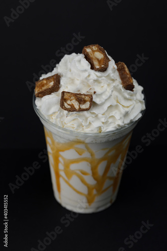 Coconut milkshake with caramel and sneakers