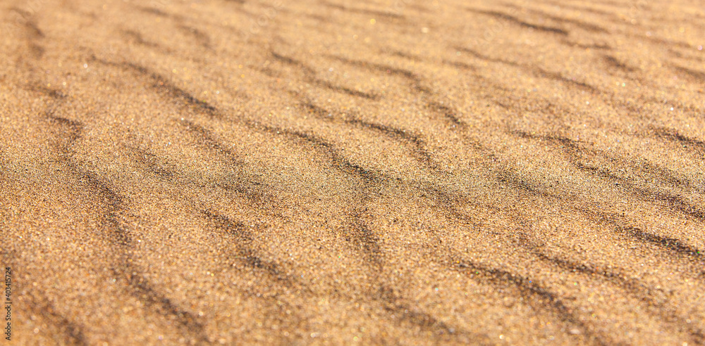 Yellow sand closeup as texture. Selective focus Yellow sand closeup as texture. Selective focus