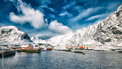 Norway. Lofoten. The village is on the water in the background of mountains and sky. © yulia.shalyapina