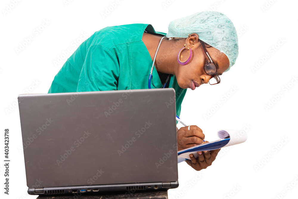 beautiful young female doctor taking notes on paper-press with l beautiful young female doctor taking notes on paper-press with l