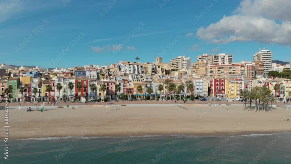 Aerial drone point panoramic view coastline and La Vila Joiosa Villajoyosa touristic resort townscape view from top, sandy beach and mediterranean seascape. Province of Alicante, Costa Blanca, Spain
