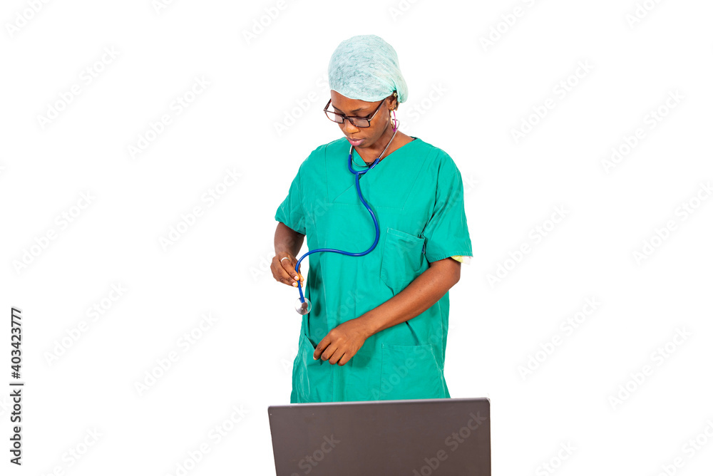 beautiful young female doctor working on laptop. beautiful young female doctor working on laptop.
