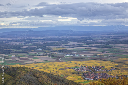 Picturesque French landscape - aerial view from the Haut-Koenigsbourg Castle. Valley, small towns and mountains in the background in the Bas-Rhin departement of Alsace, France. © dbrnjhrj