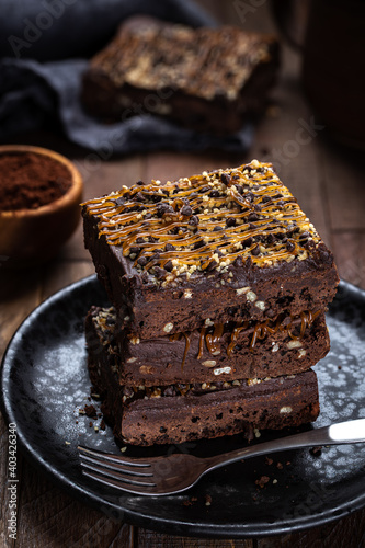 Dark Chocolate Brownies Stacked on a Plate