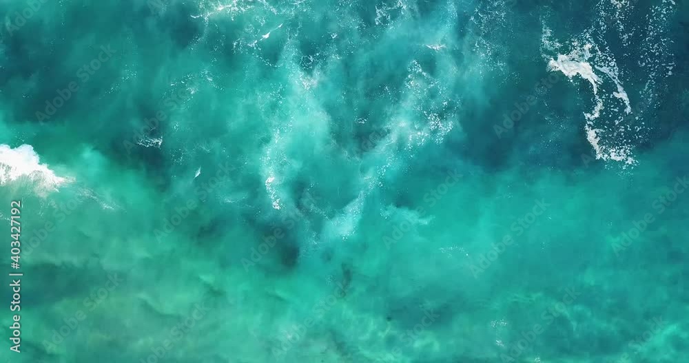 Aerial drone 4K video of beach in Australia with Pacific Ocean waves crashing in and golden sand beaches with blue water Aerial drone 4K video of beach in Australia with Pacific Ocean waves crashing in and golden sand beaches with blue water