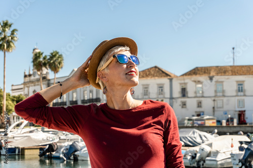 Woman enjoying sunny day in Faro, Algarve, Portugal