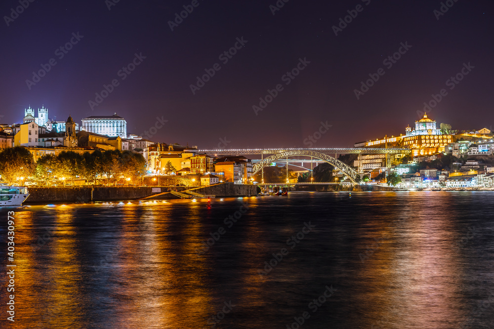 Nightscape of Porto and famous bridge over Douro river, Portugal