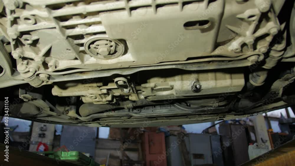 Engine oil leak car service view from the pit Engine oil leak car service view from the pit