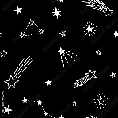 Seamless pattern. Vector doodle stars, comet and constellations on black background