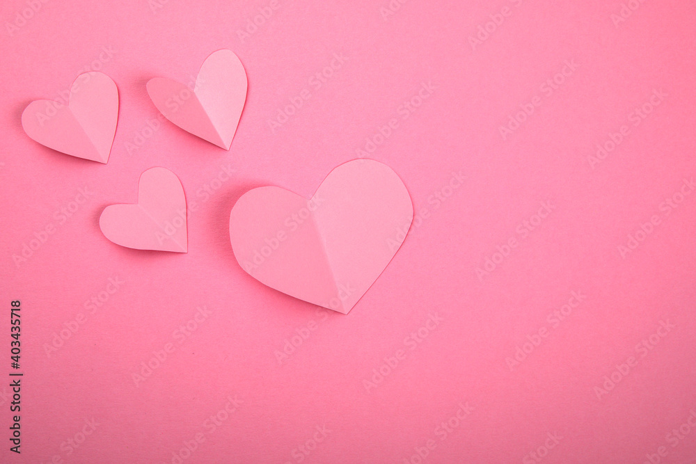 Pink hearts, symbolizes a girl or a woman. Falling in love and relationships concept