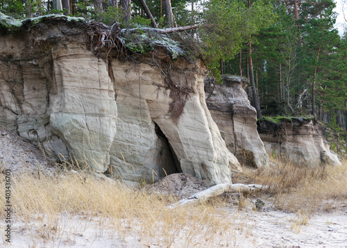 Land outcrops. The outcrops are mainly composed of fine-grained to medium-grained sandstone and alternating layers of clayey siltstone sediments. photo