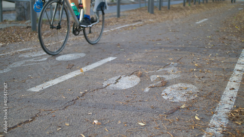 Colorful and sunny bicycle lane with a bike symbol in autumn with a cycle in mouvement - Cycle path in Marseille, France, European City