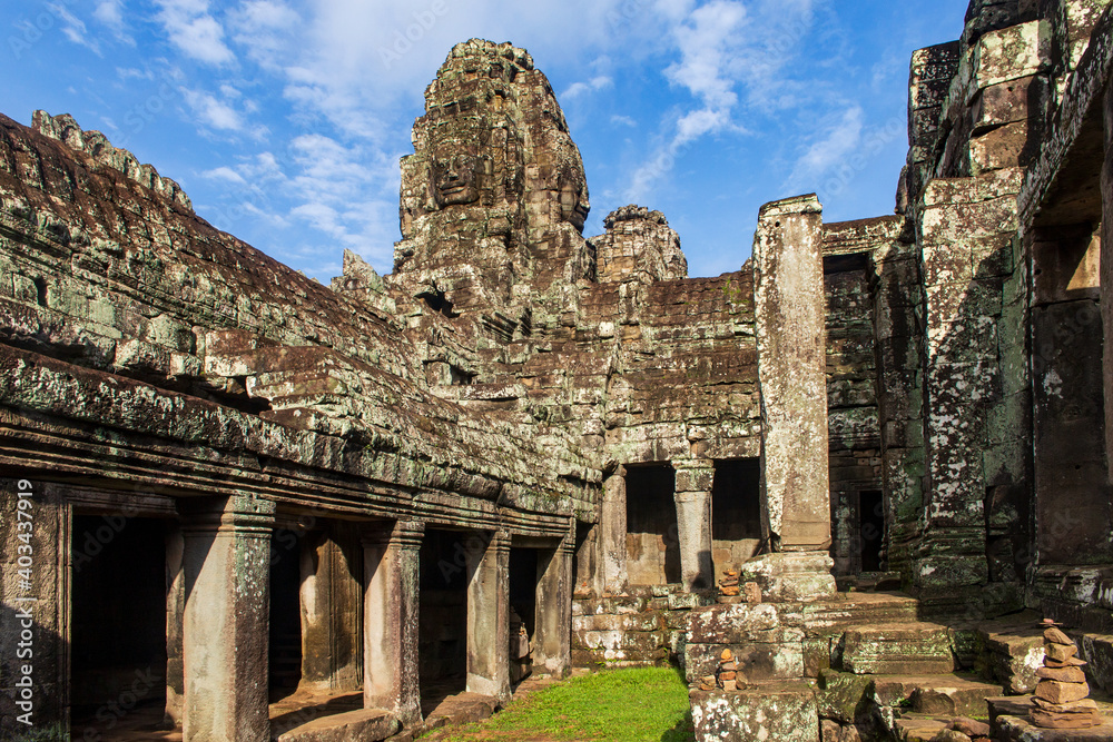 Face tower and inner gallery in the Bayon temple in Angkor Thom, Angkor. Cambodia.