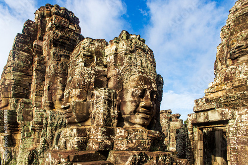 Face tower in the Bayon temple in Angkor. Cambodia. Horizontal view. © Ovnigraphic
