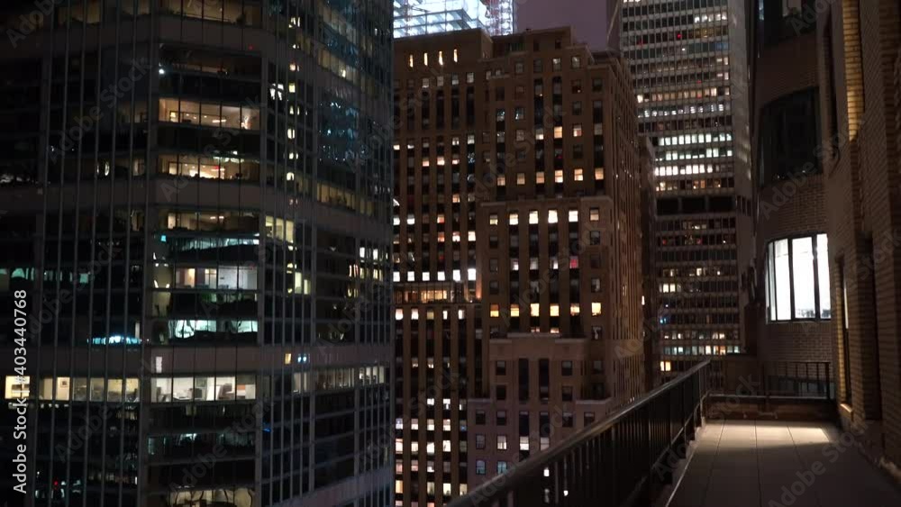 Gorgeous Night-Time Tilt-Up View of Skyscraper Buildings from the 18th Floor in New York City Gorgeous Night-Time Tilt-Up View of Skyscraper Buildings from the 18th Floor in New York City