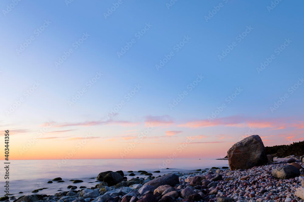 vibrant sunset over coastal landscape, Sweden