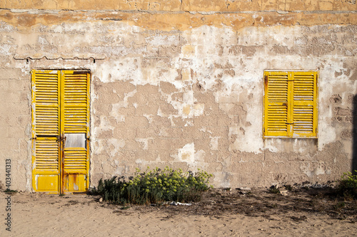 Building facade details with brick wall in a beach of Majorca, Spain