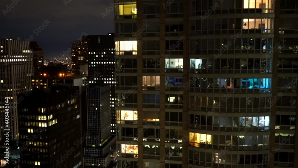 6968 - Pan Left Night Time View of The New York City Skyline from the Top Floor 6968 - Pan Left Night Time View of The New York City Skyline from the Top Floor
