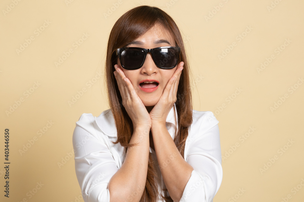 Portrait of a beautiful young asian girl in sunglasses. Portrait of a beautiful young asian girl in sunglasses.