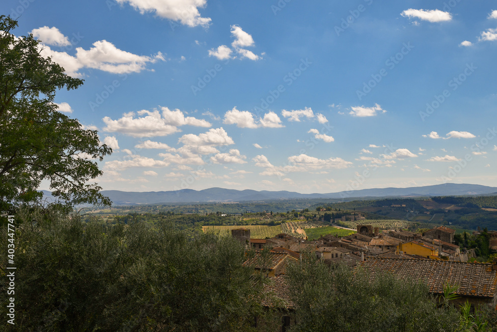 Elevated view of the hills surrounding the old town of San Gimignano, in the province of Siena, Tuscany, Italy